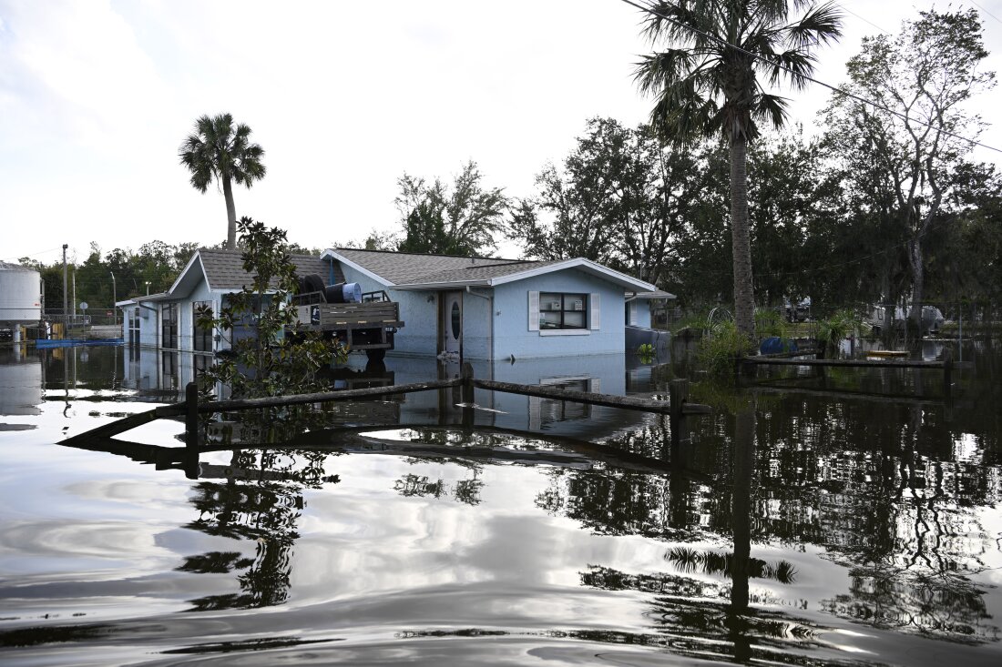 Floodwaters surround a home in the aftermath of Hurricane Helene on Friday in Crystal River, Fla.