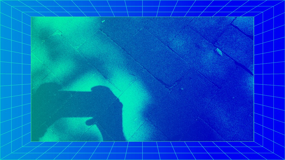 Photograph of a shadow of hands holding a smartphone