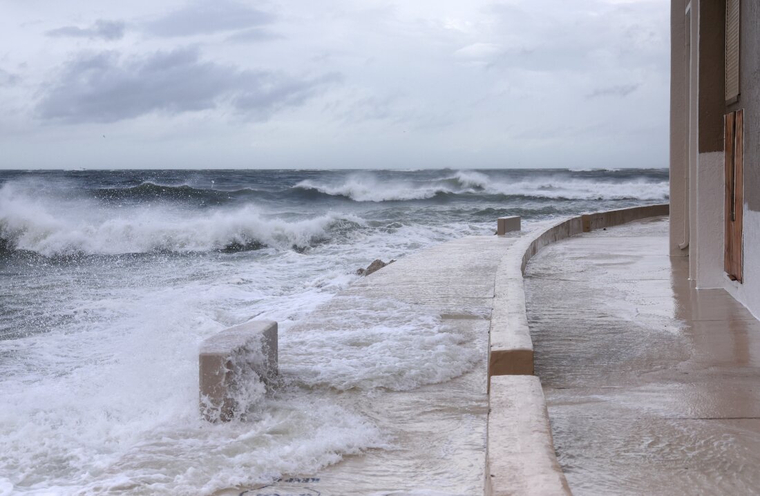 Waves from the Gulf of Mexico push up against the shore as Hurricane Helene churns offshore on September 26, 2024 in St. Pete Beach, Florida.