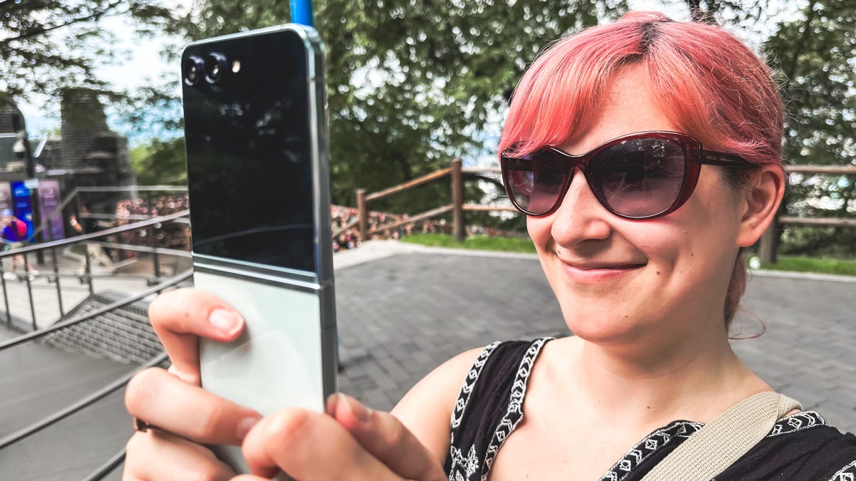 The author holding the Z Flip 5 up to take a photo.