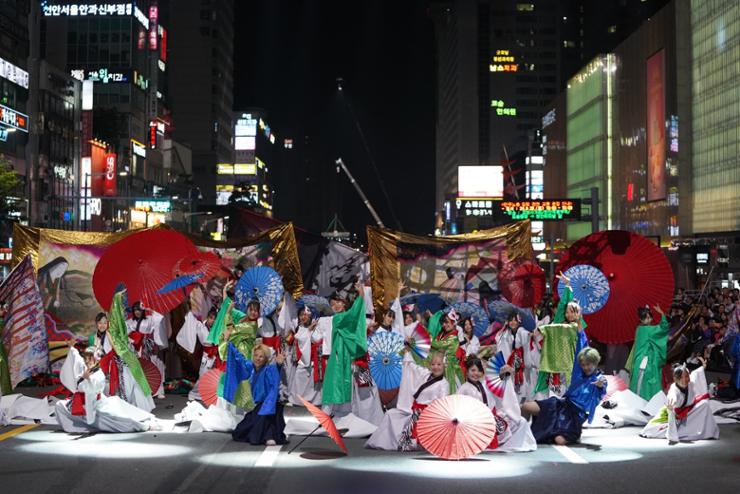 Participants in the Cheonan World Dance Festival 2024 perform during its street parade program  in the South Chungcheong provincial city, Friday. Courtesy of Cheonan City