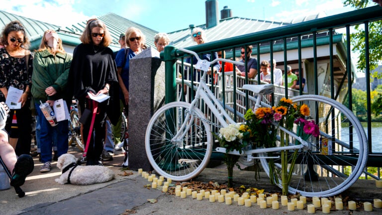 John Corcoran’s daughter, Christi, and wife, Barbara at the Ghost Bike ceremony held by cyclists and bike safety advocates on Saturday on Memorial Drive where John Corcoran was struck by a driver in Cambridge on Sept. 23.