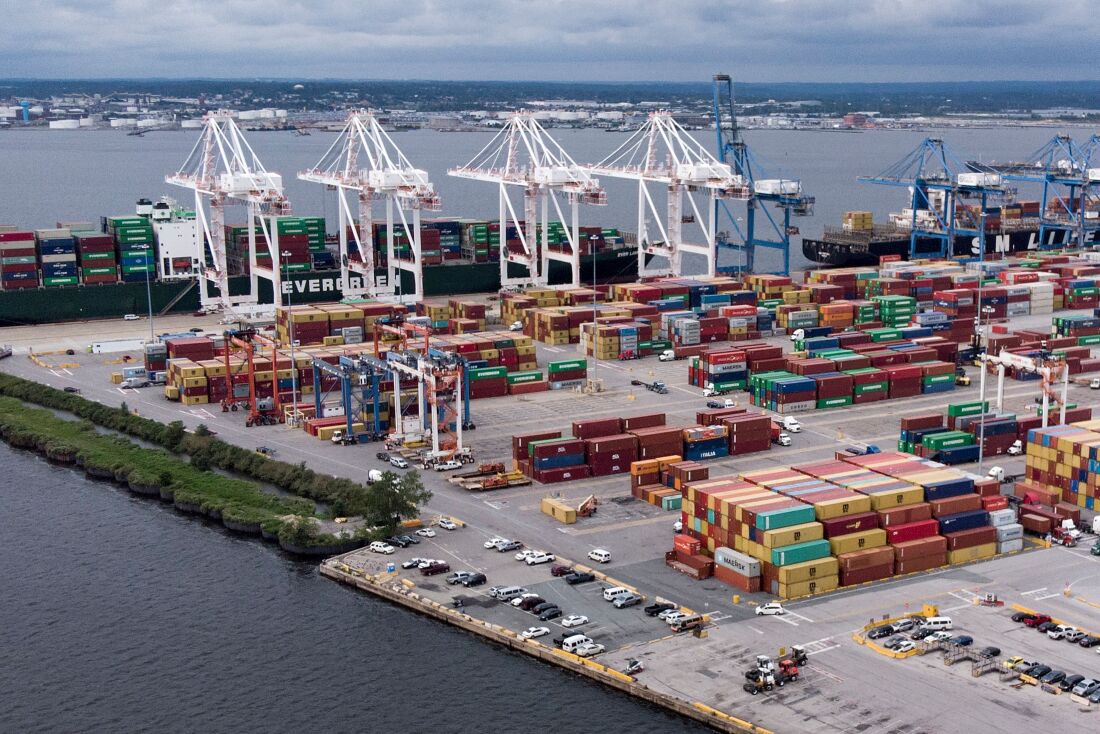 Shipping containers sit piled at the Port of Baltimore on September 21, 2018. Dockworkers on the East Coast and Gulf Coast have threatened to strike as early as October 1, if a new contract deal is not reached.