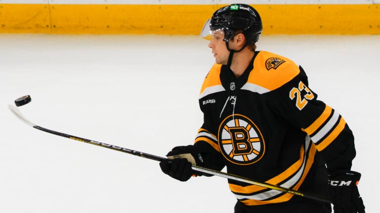 Boston Bruins Fabian Lysell controls the puck on his stick as he warms up before they play the New York Rangers during NHL pre-season action at TD Garden.