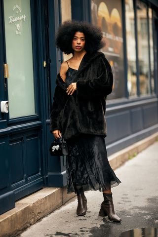 woman wearing ankle boots at Paris Fashion Week