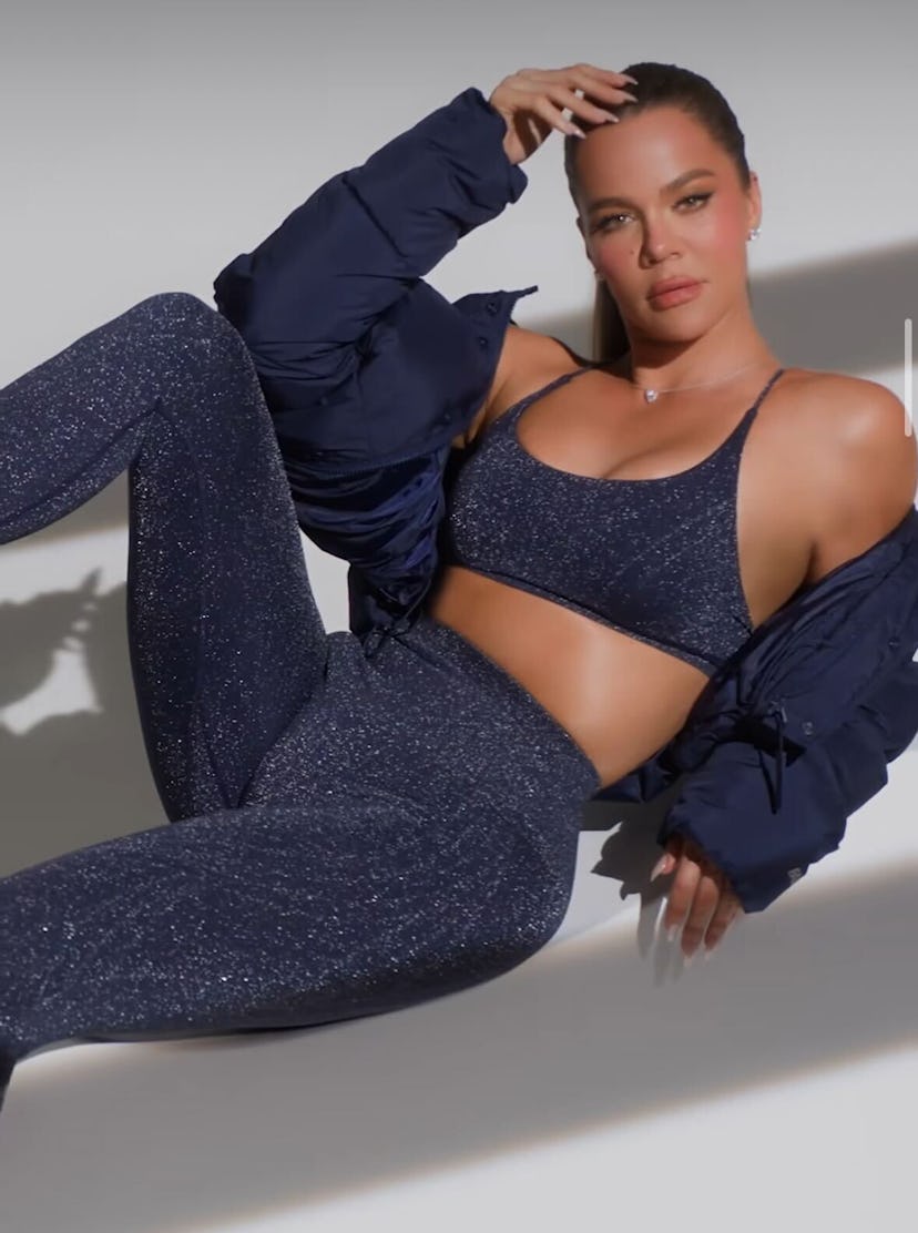 Khloé Kardashian bared her abs in Shimmery Athleticwear for Fabletics campaign