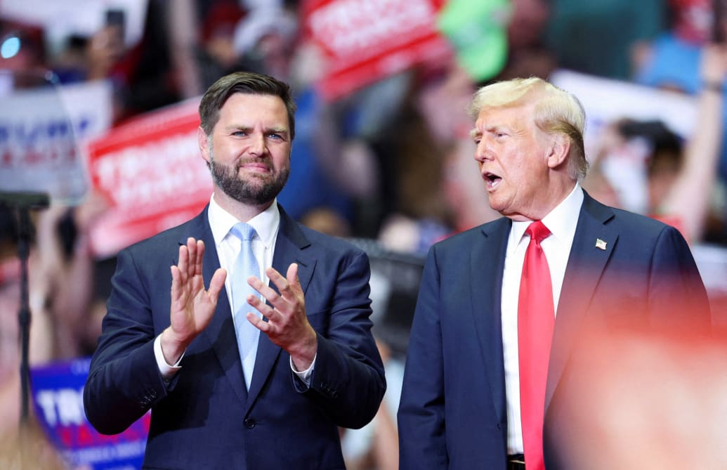 JD Vance, left, with Donald Trump in Grand Rapids, Michigan, U.S. July 20, 2024.