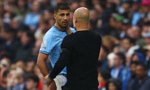 Premier League - Manchester City v Arsenal<br>Soccer Football - Premier League - Manchester City v Arsenal - Etihad Stadium, Manchester, Britain - September 22, 2024
Manchester City's Rodri with manager Pep Guardiola after being substituted REUTERS/Molly Darlington EDITORIAL USE ONLY. NO USE WITH UNAUTHORIZED AUDIO, VIDEO, DATA, FIXTURE LISTS, CLUB/LEAGUE LOGOS OR 'LIVE' SERVICES. ONLINE IN-MATCH USE LIMITED TO 120 IMAGES, NO VIDEO EMULATION. NO USE IN BETTING, GAMES OR SINGLE CLUB/LEAGUE/PLAYER PUBLICATIONS. PLEASE CONTACT YOUR ACCOUNT REPRESENTATIVE FOR FURTHER DETAILS..