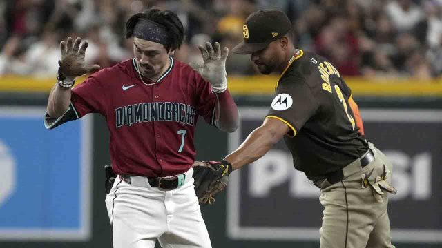 Ohtani has two hits to close on batting leader Arraez as Dodgers beat Rockies