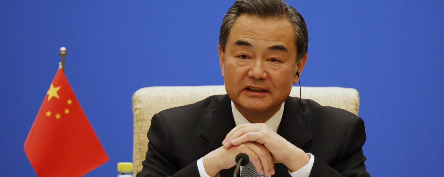 Chinese Foreign Minister Wang Yi speaks duriong the meeting of the Foreign Ministers of China, Russia and India at Diaoyutai State guesthouse in Beijing Monday, Feb. 2, 2015 - Sputnik International, 1920, 24.09.2024