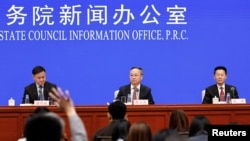 People's Bank of China Governor Pan Gongsheng, National Financial Regulatory Administration Minister Li Yunze and China Securities Regulatory Commission Chairman Wu Qing attend a press conference in Beijing, China, Sept. 24, 2024.