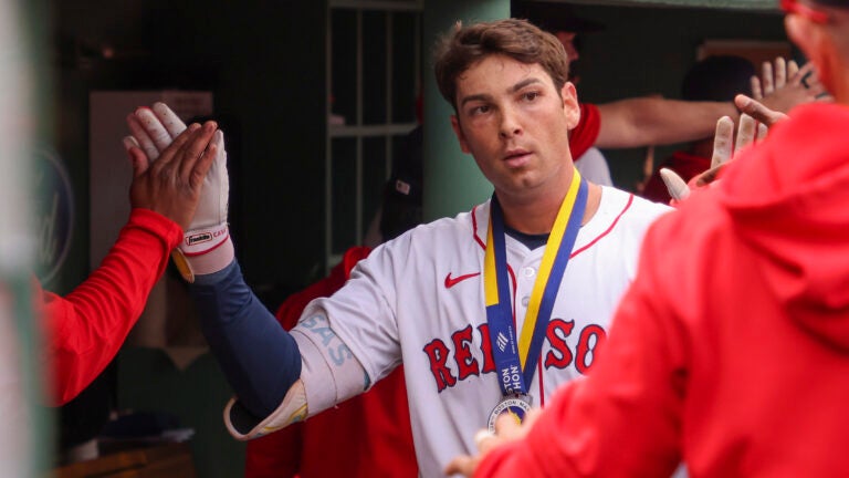 Triston Casas slugged three home runs in the first game of Sunday's doubleheader against the Twins.