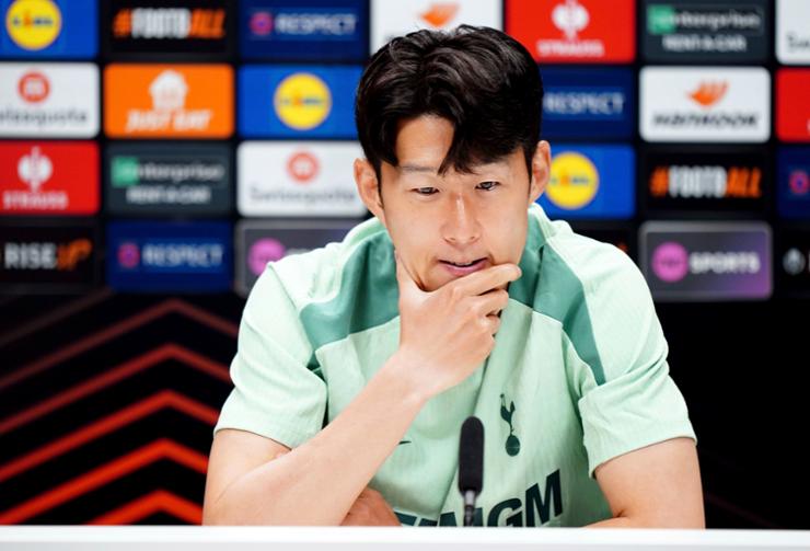 Son  min-Heung gestures during a press conferece at Hotspur Way Training Ground in London, Wednesday. AP-Yonhap