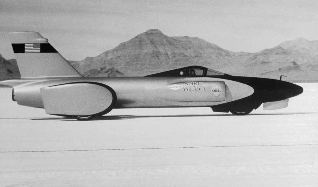 The jet-powered 'Spirit of America,' with Craig Breedlove at the wheel, on the Bonneville Salt Flats. The three-wheeled racer was powered by a J47 engine — the same type used in an F104 jet fighter plane.