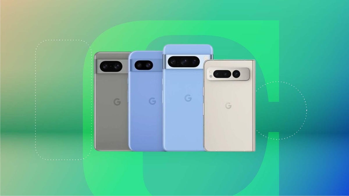 Four Google Pixel phones lined up on a green background