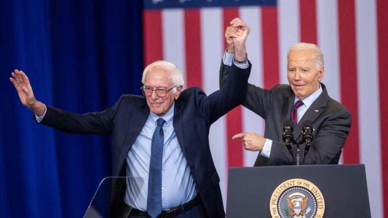 U.S. Sen. Bernie Sanders (I-VT) joins U.S. President Joe Biden on stage after he delivered remarks at NHTI Concord Community College on October 22, 2024 in Concord, New Hampshire.