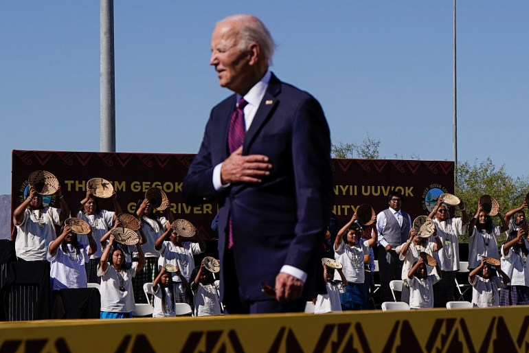 U.S. President Joe Biden gestures during a performance, at Gila Crossing Community School in Gila River Indian Community, Arizona, U.S., October 25, 2024. REUTERS/Elizabeth Frantz