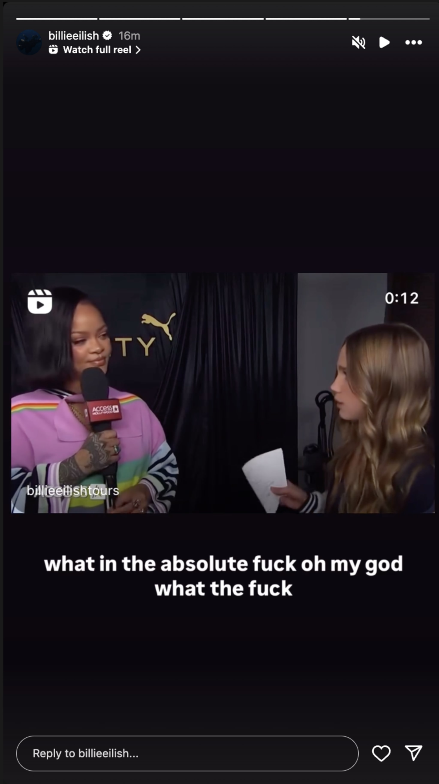 Rihanna being interviewed, holding a microphone, wearing a colorful hoodie. Video reposted by Billie Eilish on Instagram.