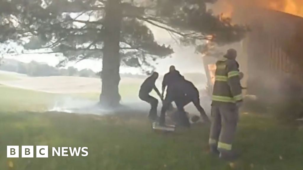 Bodycam captures moment woman rescued from burning house in Ohio