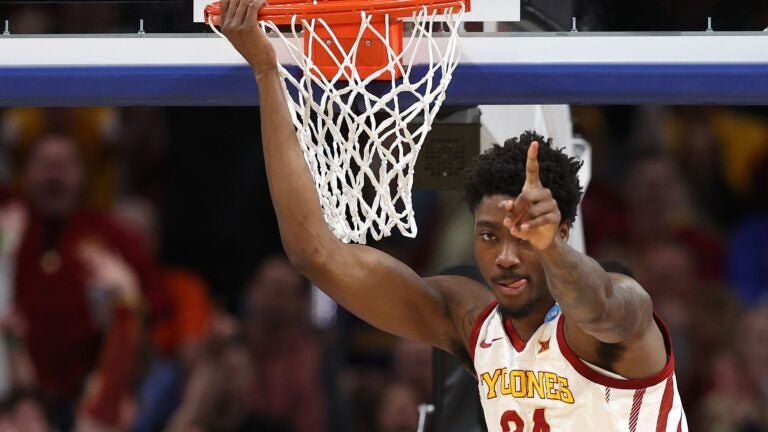 OMAHA, NEBRASKA - MARCH 23: Hason Ward #24 of the Iowa State Cyclones reacts after dunking the ball during the first half against the Washington State Cougars in the second round of the NCAA Men's Basketball Tournament at CHI Health Center on March 23, 2024 in Omaha, Nebraska.