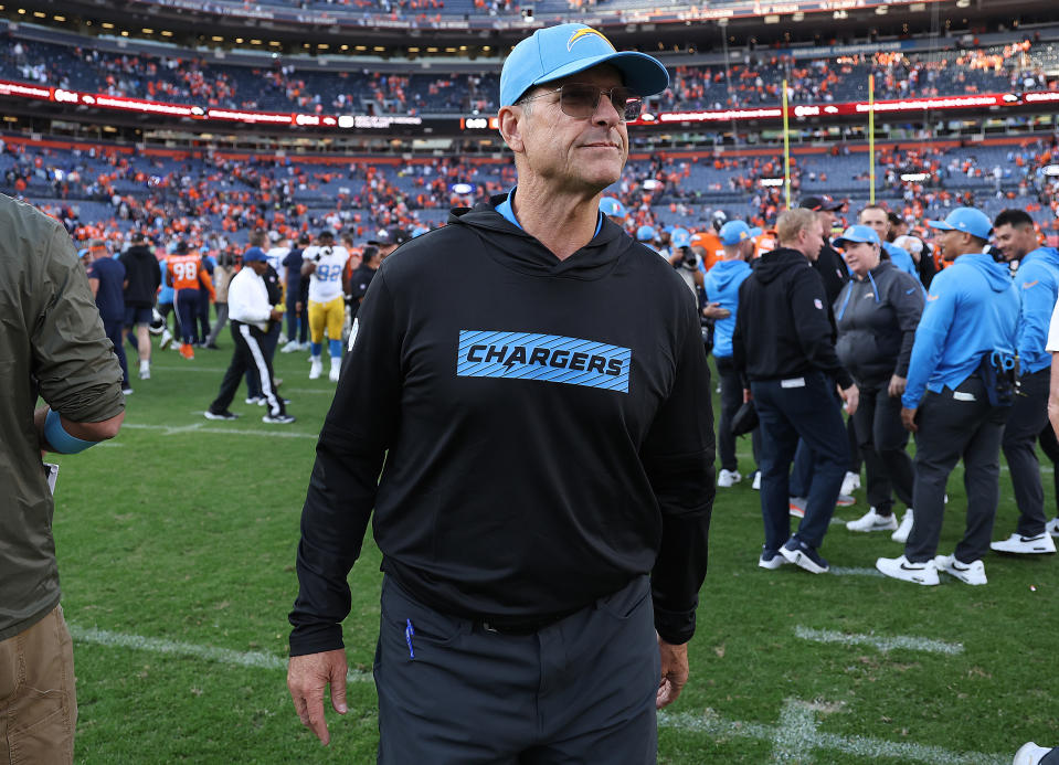 DENVER, COLORADO - OCTOBER 13: Head coach Jim Harbaugh of the Los Angeles Chargers on the field following their 23-16 win against the Denver Broncos at Empower Field At Mile High on October 13, 2024 in Denver, Colorado. (Photo by Matthew Stockman/Getty Images)