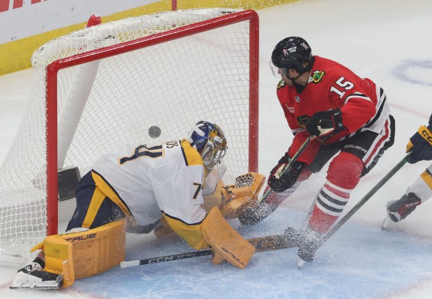 Blackhawks center Craig Smith (15) scores in the first period against the Predators at the United Center on Oct. 25, 2024, in Chicago. (John J. Kim/Chicago Tribune)