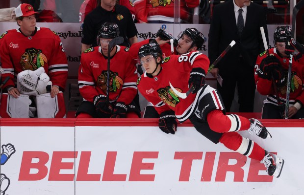 Blackhawks center Connor Bedard (98) gets on the ice in the first period of a preseason game against the Wild at the United Center on Oct. 4, 2024, in Chicago. (John J. Kim/Chicago Tribune)