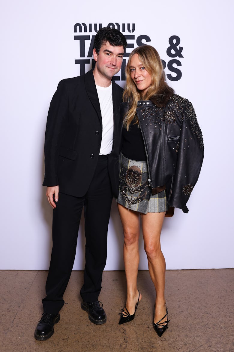 Siniša Mačković and Chloë Sevigny attend Miu Miu Tales & Tellers vernissage at Palais d'Iena on Octo...