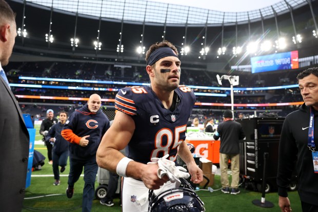 Bears tight end Cole Kmet runs off the field after a victory over the Jaguars at Tottenham Hotspur Stadium in London on Oct. 13, 2024. (Chris Sweda/Chicago Tribune)