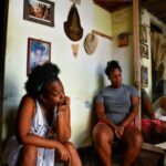 Oney Machado and Diana Machado sit in the house as Cuba suffers a third major setback in restoring power to the island, with millions still in the dark, in Havana, Cuba, Oct. 20. Reuters-Yonhap