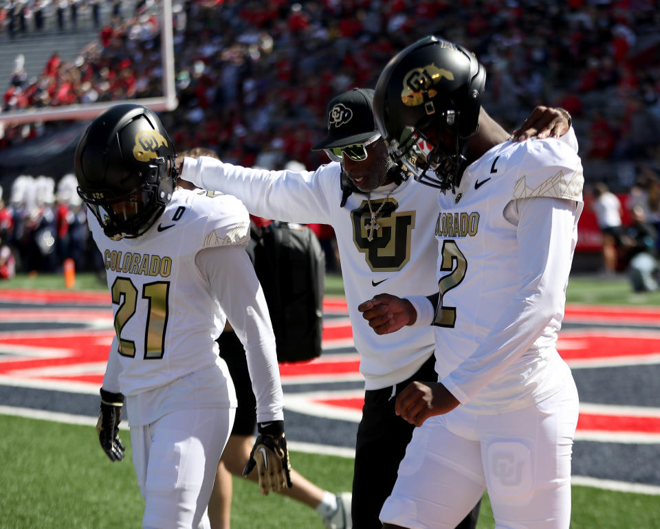 TUCSON, AZ - OCTOBER 19: Colorado Buffaloes head coach Deion Sanders, quarterback Shedeur Sanders #2  and safety Shilo Sanders #21 prior to a football game between the University of Colorado Buffaloes and the University of Arizona Wildcats.  October 19, 2024 at Arizona Stadium in Tucson, AZ. (Photo by Christopher Hook/Icon Sportswire via Getty Images)