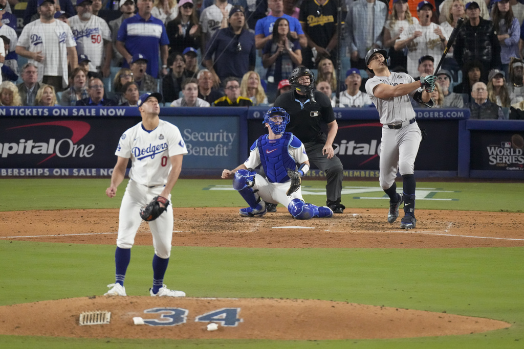 Dodgers’ Jack Flaherty has strong performance in Game 1 win, but fellow Southern Californian Giancarlo Stanton knocks him out of game