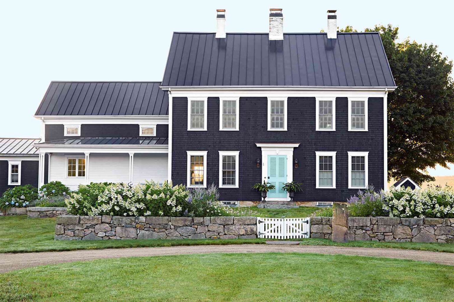 Does Painting Your House a Dark Color Make It Hotter? Here's What Experts Say