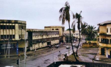 Prison building with road running beside and palm trees