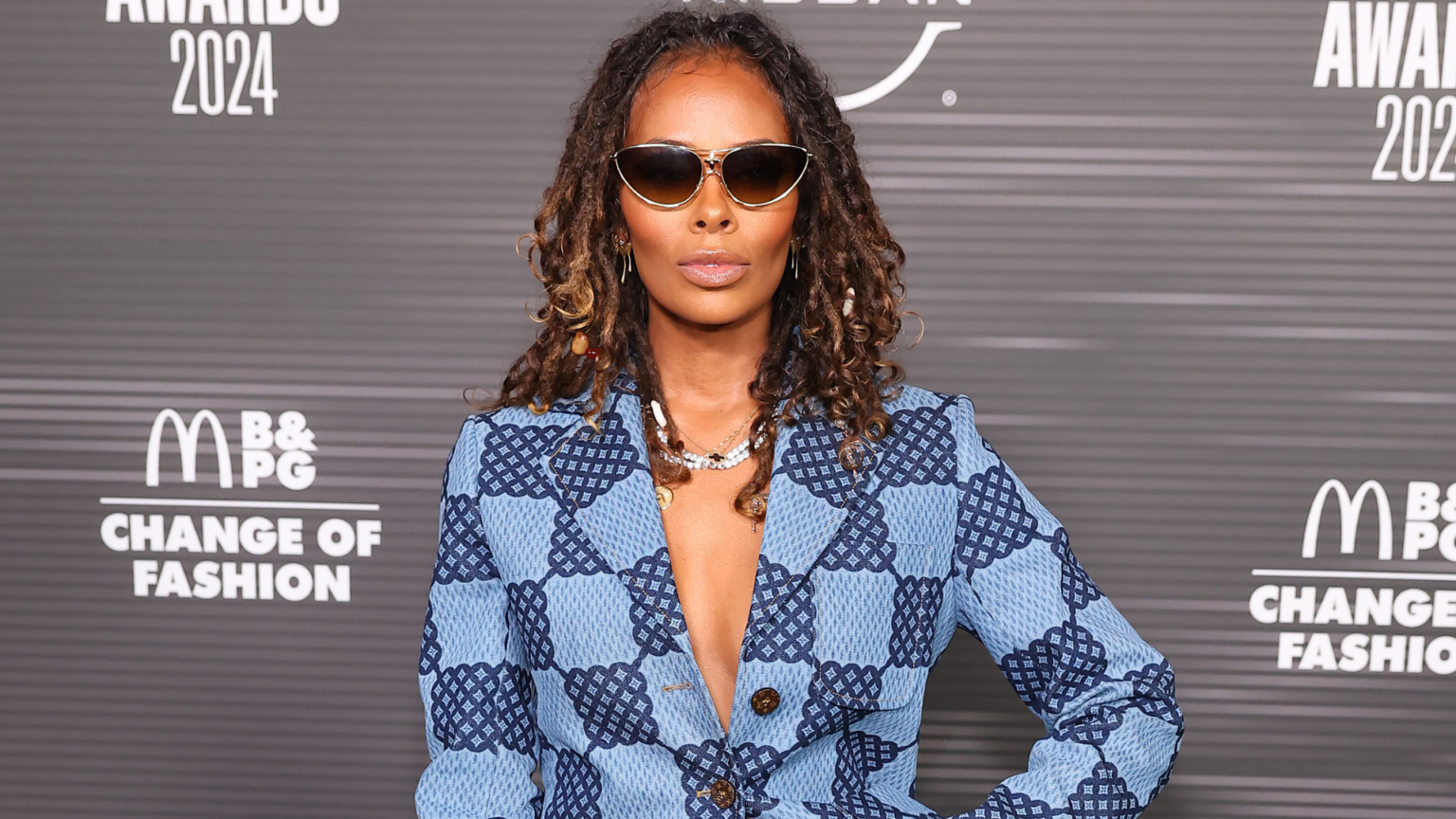 Eva Marcille Embraces The Office Siren Trend With Louis Vuitton Suit At BET Hip Hop Awards