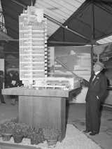 Frank Lloyd Wright points to a model of Price Tower in 1953. The 221-foot building in Bartlesville, Oklahoma, is the only Wright-designed skyscraper ever realized.