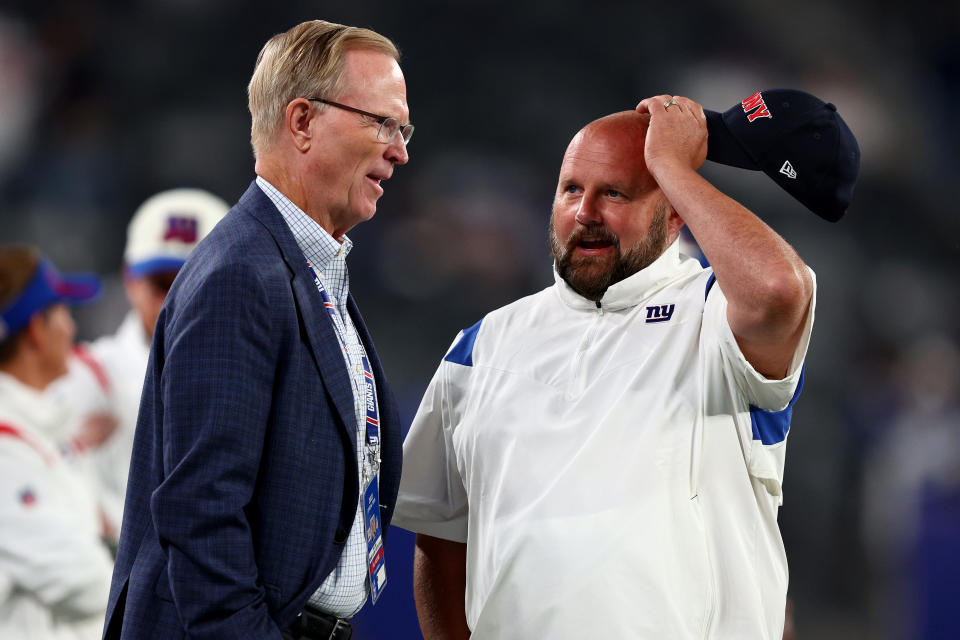 EAST RUTHERFORD, NEW JERSEY - SEPTEMBER 26: (L-R) President and CEO John K. Mara of the New York Giants talks with head coach Brian Daboll prior to the game against the Dallas Cowboys at MetLife Stadium on September 26, 2022 in East Rutherford, New Jersey. (Photo by Elsa/Getty Images)