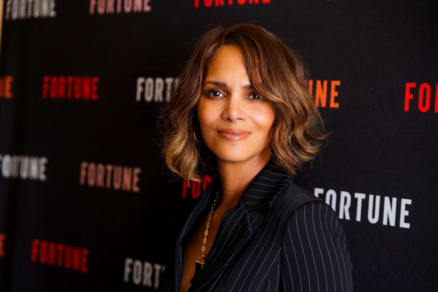 Halle Berry Made Business Casual So Sexy in a Plunging Blazer