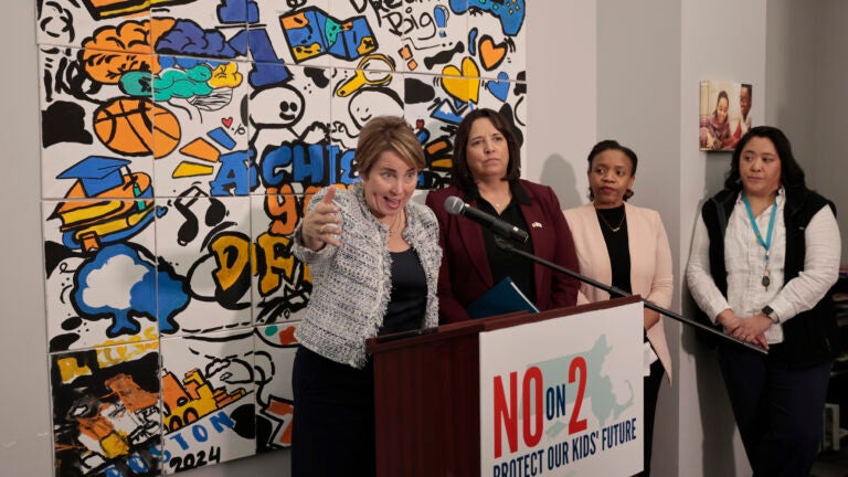 Governor Maura Healey takes questions, as officials, hold a press conference Wednesday to detail their opposition to Question 2.