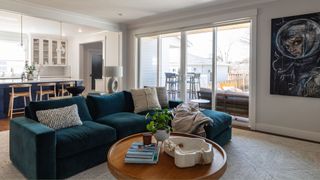 A blue couch in a living room