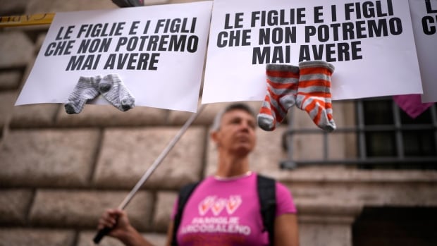 Italy passes law banning surrogacy abroad that activists say targets LGBTQ+ couples | CBC News