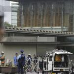 Japan's ruling party headquarters is attacked with firebombs and suspect is arrested