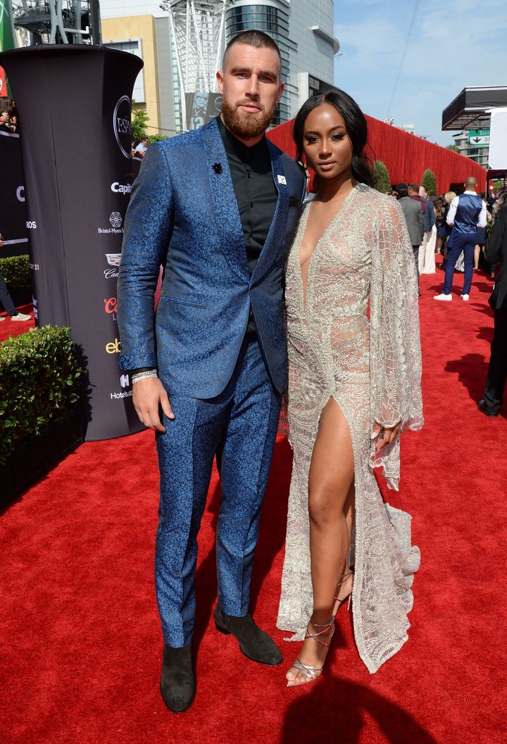 Travis Kelce, left, and Kayla Nicole appear at a red-carpet event on July 18, 2018, in Los Angeles, California.