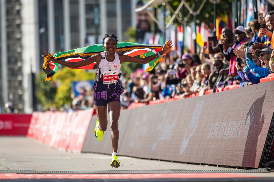 Ruth Chepng'etich, from Kenya, shattered the world record time at the Chicago Marathon on Sunday. (Tess Crowley/Chicago Tribune/Tribune News Service via Getty Images)