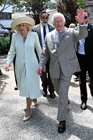 King Charles III and Queen Camilla depart following a service at St. Thomas's Anglican Church on October 20, 2024 in Sydney, Australia.