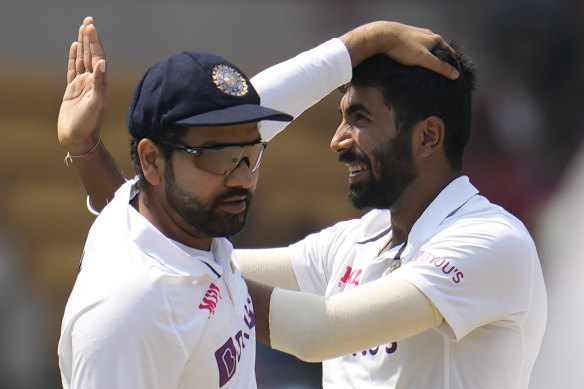 Indian captain Rohit Sharma (left) with Jasprit Bumrah.