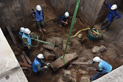 Korean workers and officials take part in a project to recover a major cultural asset in Laos, in this photo provided by the Korea Heritage Service, Jan. 3. Yonhap