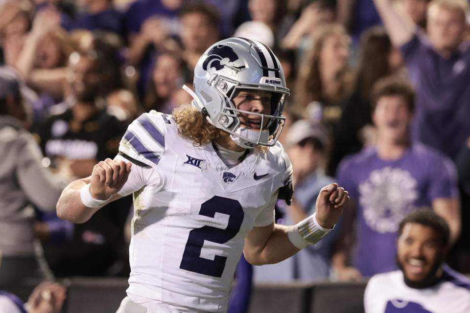 BOULDER, COLORADO - OCTOBER 12: Avery Johnson #2 of the Kansas State Wildcats celebrates after scoring a touchdown during the first quarter against the Colorado Buffaloes at Folsom Field on October 12, 2024 in Boulder, Colorado. (Photo by Andrew Wevers/Getty Images)