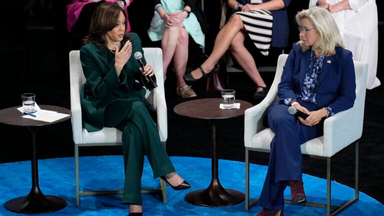 Democratic presidential nominee Vice President Kamala Harris, left, and former Congresswoman Liz Cheney, right, during a town hall at Sharon Lynne Wilson Center for the Arts in Brookfield, Wisc., Monday, Oct. 21, 2024.