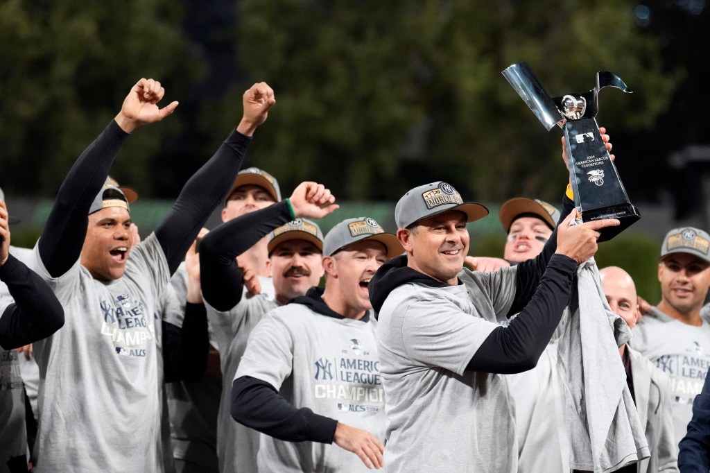 Lots of ‘love,’ a champagne shower and a special embrace awaited Aaron Boone after Yankees’ pennant clincher